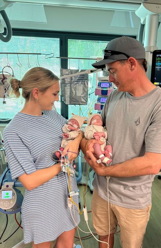 Proud parents Melissa and Matthew with their tiny bundles of joy, twins Lucy and Lilly were born on September 6. Picture: Contributed