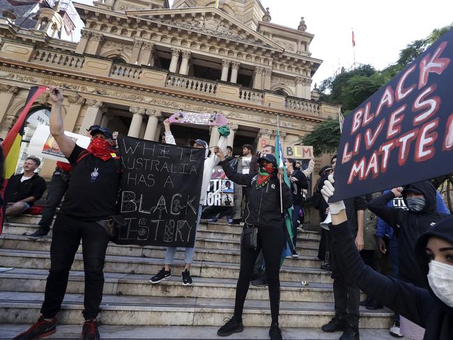 Protestors gather at Town Hall in Sydney on the weekend. Picture: AP