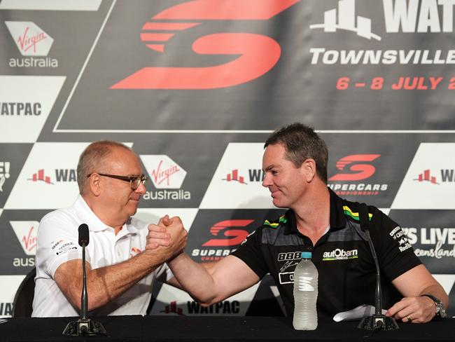 Roland Dane daps up Supercars legend Craig Lowndes. Picture: Daniel Kalisz/Getty Images