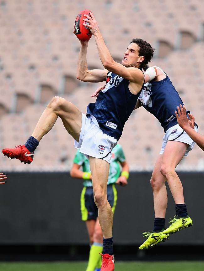 Ben King of Vic Metro marks against Vic Country on June 24. Picture: Quinn Rooney/Getty Images