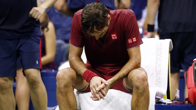 A downcast Roger Federer during the match. (AP Photo/Jason DeCrow)