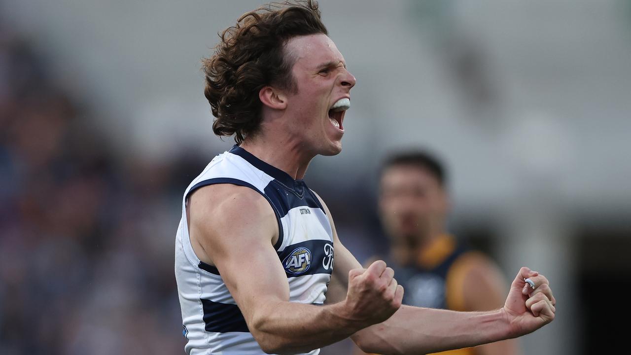 GEELONG, AUSTRALIA - MAY 06: Max Holmes of the Cats celebrates after scoring a goal during the round eight AFL match between Geelong Cats and Adelaide Crows at GMHBA Stadium, on May 06, 2023, in Geelong, Australia. (Photo by Robert Cianflone/Getty Images)