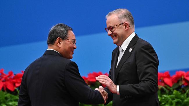 Anthony Albanese shakes hands with Chinese Premier Li Qiang in Singapore, during his trip to China last November. Picture: Hector Retamal / AFP