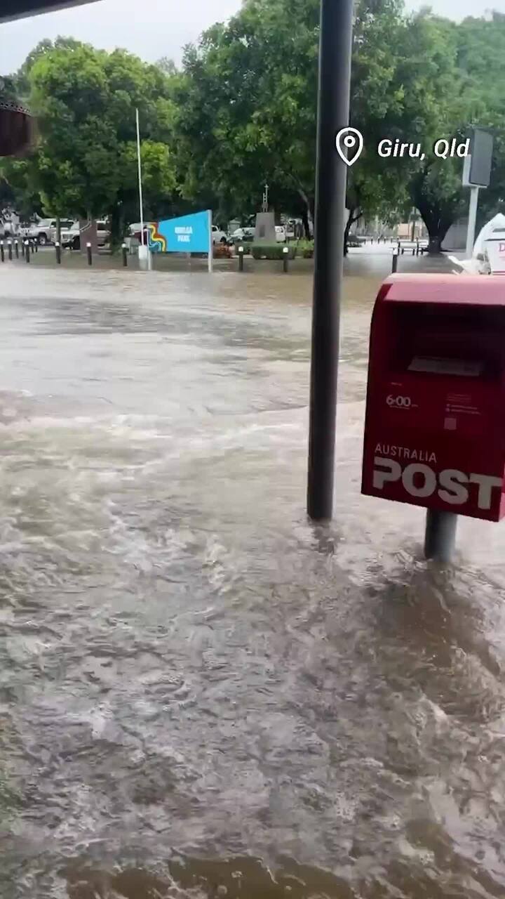 Floodwaters rush through Giru, south of Townsville