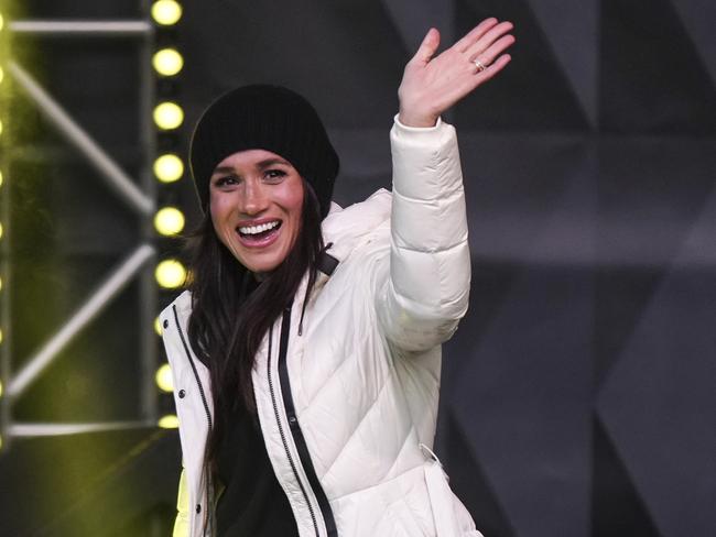 Meghan, the Duchess of Sussex, waves while attending a welcome celebration with her husband Britain's Prince Harry, the Duke of Sussex, during the 2025 Invictus Games, in Whistler, British Columbia, Monday, Feb. 10, 2025. (Darryl Dyck/The Canadian Press via AP)