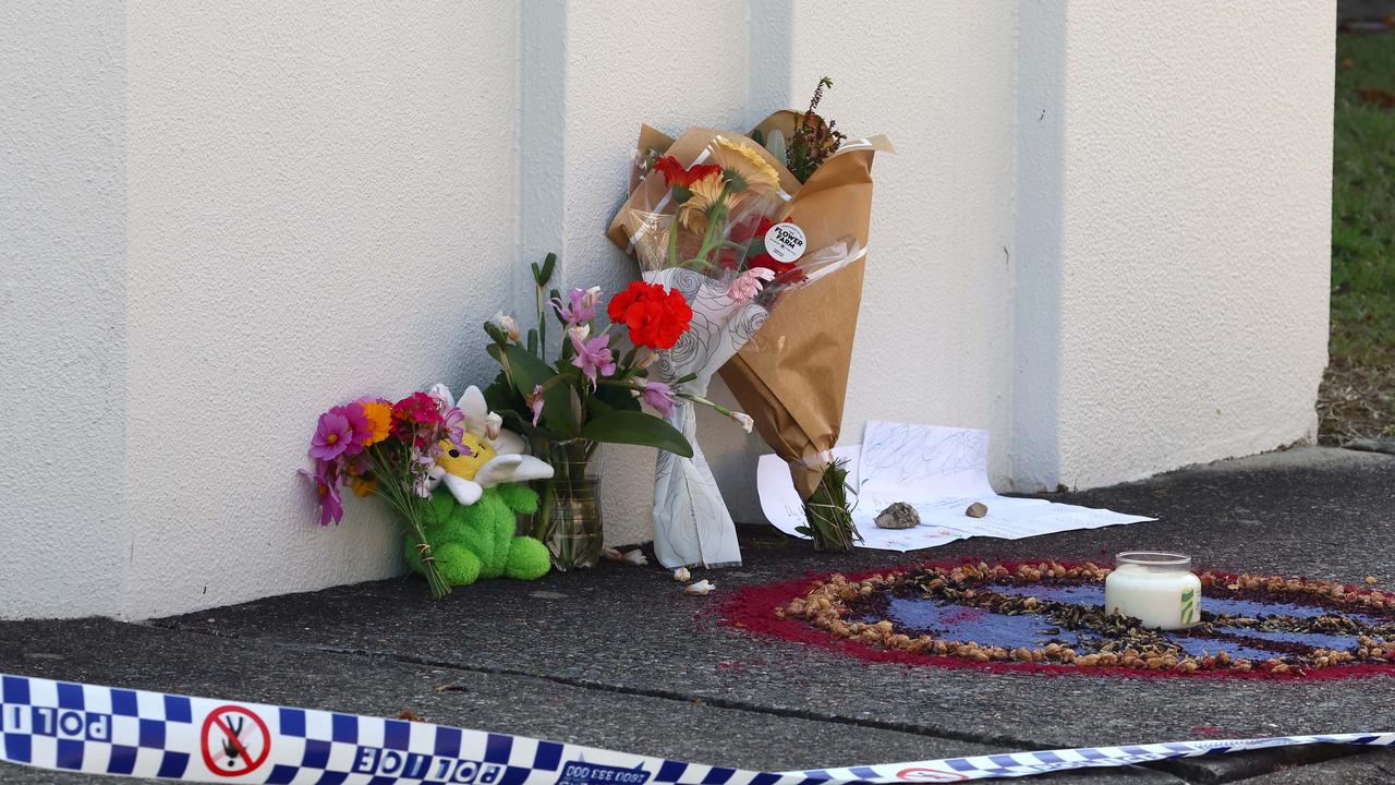 Flowers and a peace symbol were also left. Picture: NewsWire/Tertius Pickard