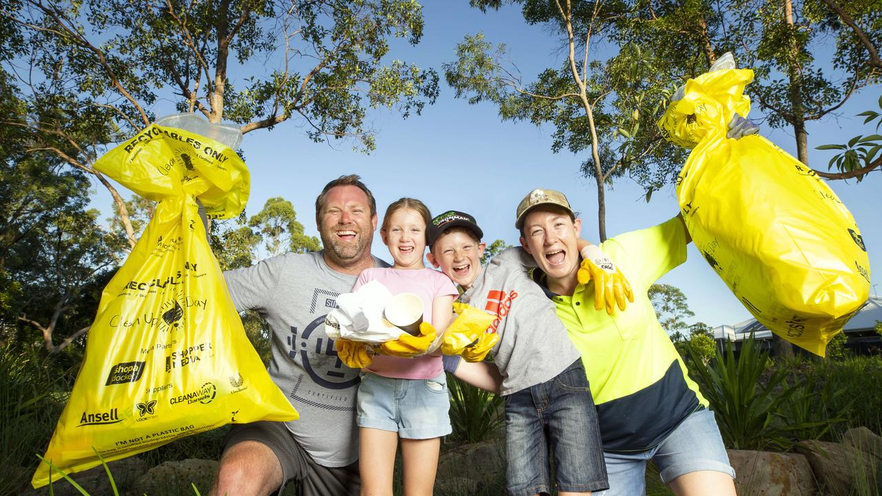 Queensland’s Mercer family – dad Tony, kids Abigail, 6, and Lachlan, 9, and mum Liz – joined in Clean Up Australia Day activities, picking up rubbish in their Brookhaven community in March 2021. Picture: Renae Droop