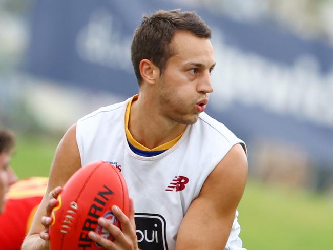 New recruit Tom Doedee at training in front of Lions fans at Brighton Home Arena on Sunday. Picture Lachie Millard