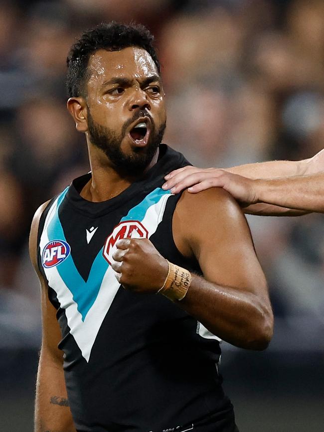 Willie Rioli celebrates a goal against Geelong last year.