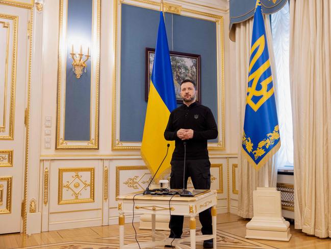 Ukraine's President Volodymyr Zelensky gives a press conference in Kyiv on February 26, 2025, amid the Russian invasion of Ukraine. Kyiv and Washington have agreed a deal to give the United States access to Ukrainian mineral resources, following a spat between US President Donald Trump and Ukrainian leader Volodymyr Zelensky. (Photo by Tetiana DZHAFAROVA / AFP)