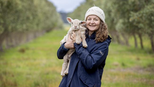 Jen Ma with a Babydoll Southdown lamb. Picture: Zoe Phillips