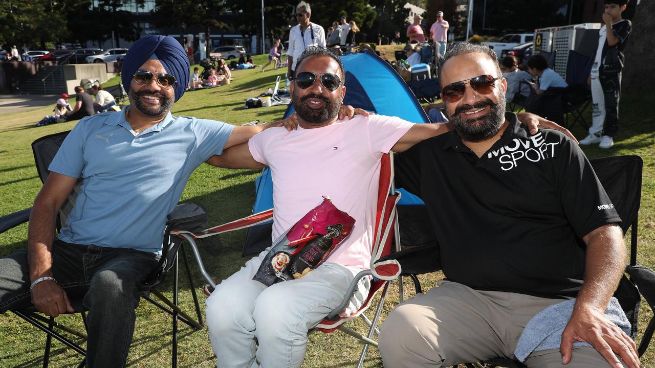 Ajit Walia, Harbin Dergosl and Harbinda Gosal. Locals and visitors arrived early to get a good spot for the Geelong New Years Eve celebrations. Picture: Alan Barber