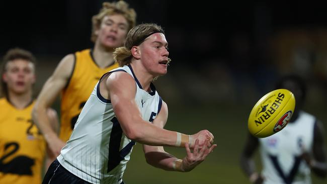 PERTH, AUSTRALIA – JUNE 30: Harley Reid of Victoria Country handballs during the 2023 AFL National Championships U18 Boys match between Western Australia and Vic Country at the WACA on June 30, 2023 in Perth, Australia. (Photo by Paul Kane/AFL Photos/via Getty Images)