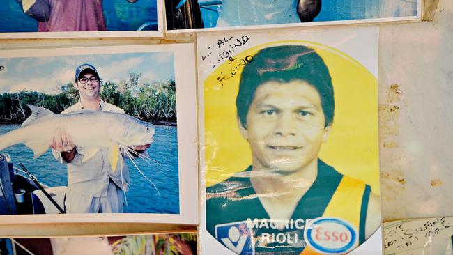 Maurice Rioli among fishing photos at the Clearwater Island Lodge in Pirlangimpi.