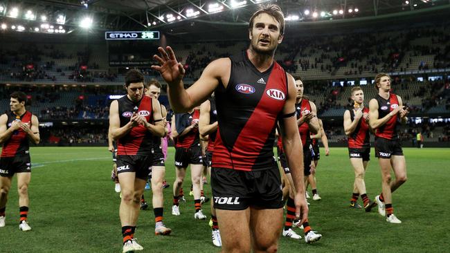 Jobe Watson walks off after the Bombers were belted in his 200th game. Picture: Colleen Petch