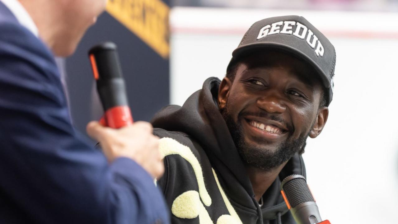 Boxing legend Terence Crawford on stage with News Corp reporter Peter Badel. Photo: Darren Burns,