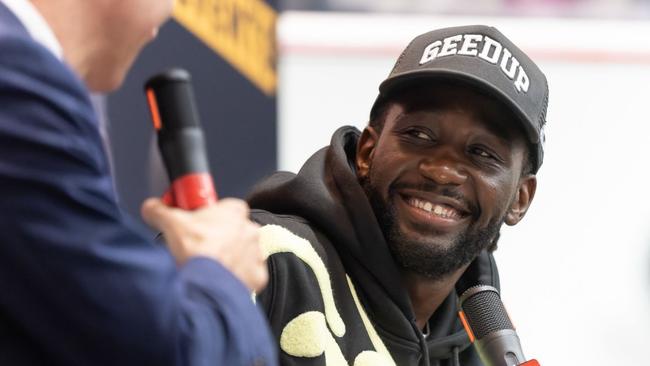 Boxing legend Terence Crawford on stage with News Corp reporter Peter Badel. Photo: Darren Burns,