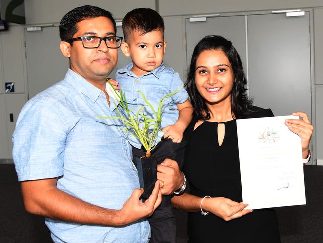 New Australian citizens Maheshwor Devkota, Aarjan Devkota and Deepika Devkota Sharma at the City of Darwin citizenship ceremony. Picture: Katrina Bridgeford