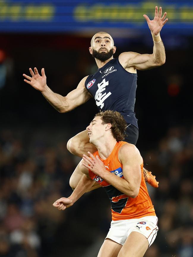 Adam Saad takes off over James Peatling. Picture: Daniel Pockett/Getty Images