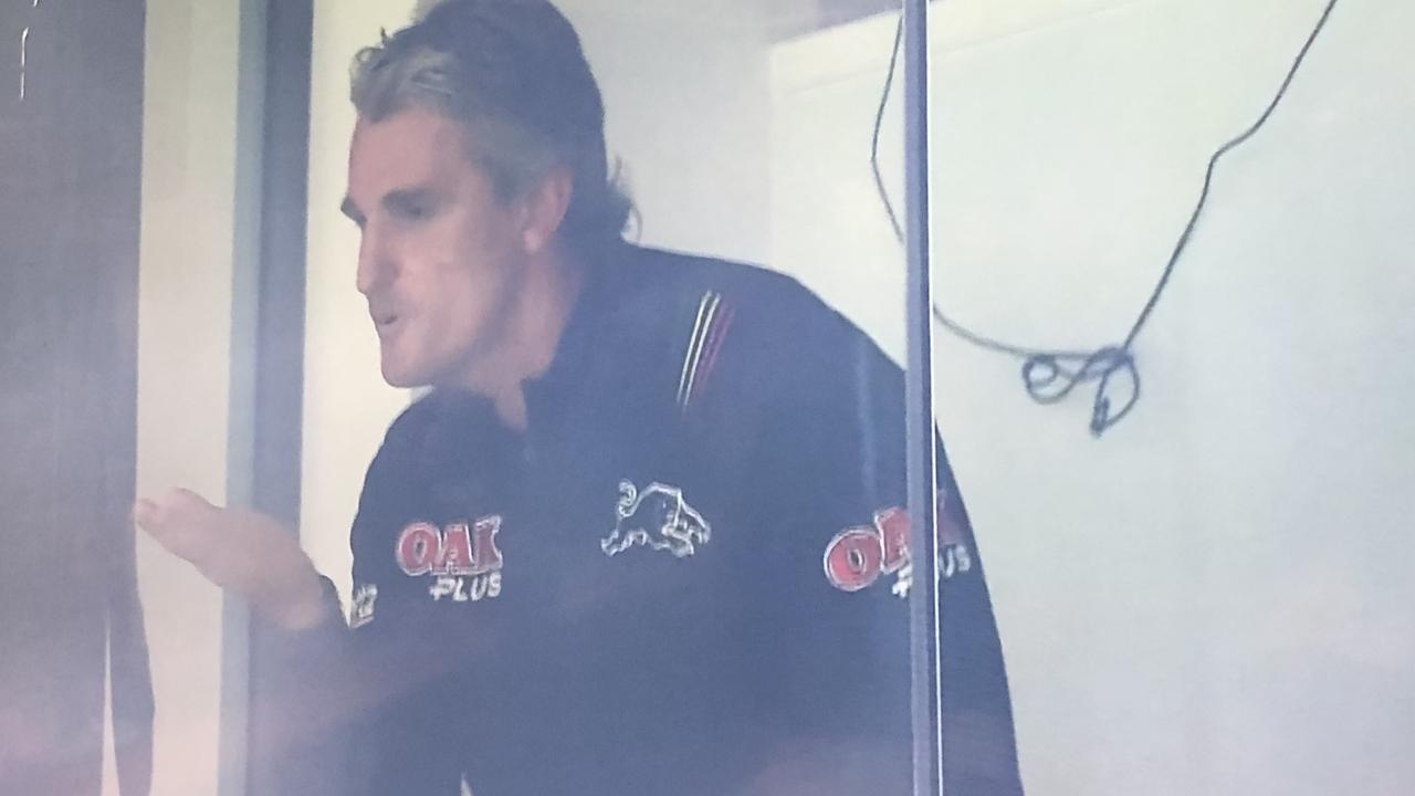 Panthers coach Ivan Cleary blows a kiss to fans.