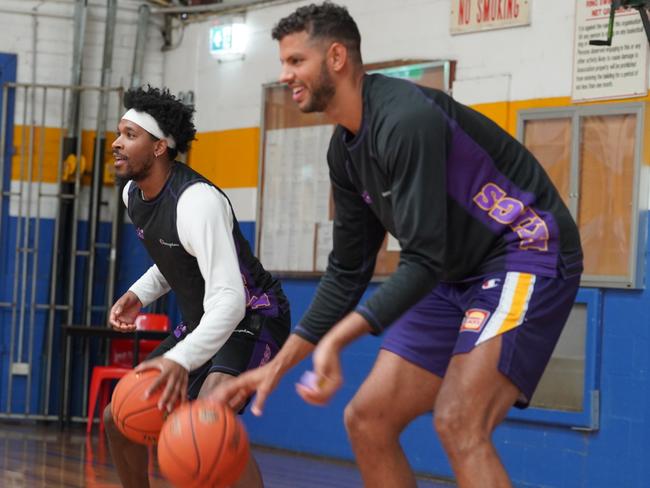 New Sydney Kings Brazilian big man Tim Soares, pictured with fellow new import Justin Simon, is primed to make an impact in the NBL.