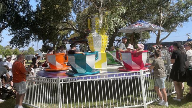 Punters on the teacups ride at Hello Sunshine festival at Caribbean Gardens.