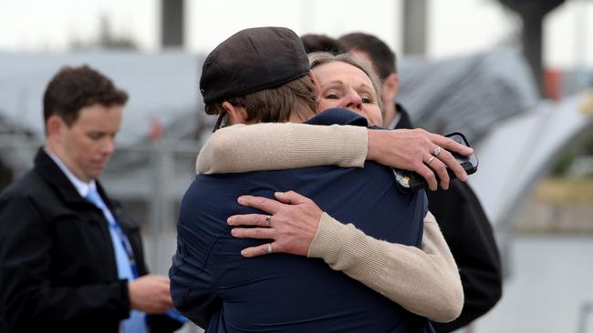 Emotional scenes at ATET after the blaze. Picture: Andrew Henshaw