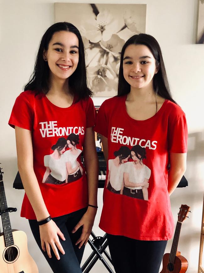 Mentone Girls' Secondary College sisters Kira and Violet support the school's music T-shirt dress up day.