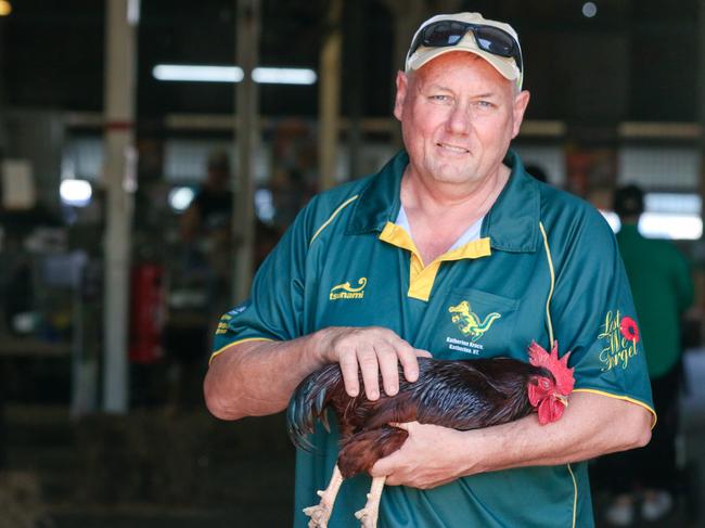 Ian Young with his champion Bantam Rooster on day two of the Royal Darwin Show. Picture: Glenn Campbell