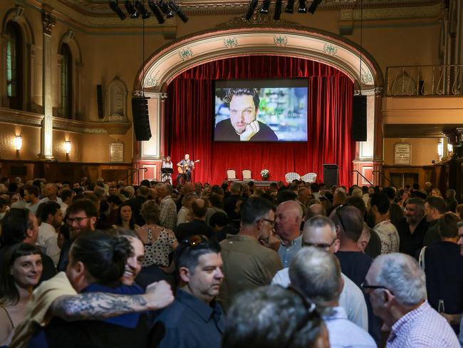 There were hundreds of people at the Hawthorn Arts Centre for the memorial. Picture: Ian Currie