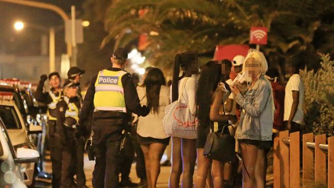 Youths in St Kilda on Saturday night. Picture: Mark Stewart