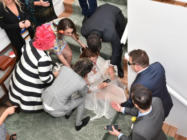 Gina Rinehart after she fell down the stairs in the Emirates marquee. Picture: AAP Image/Julian Smith