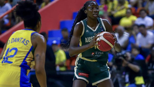 Australia's player Ezi Magbegor controls the ball during the women's Pre-olympic Tournament match between Brazil and Australia at the Arena Guilherme Paraense in Belem, Para state, Brazil on February 8, 2024. (Photo by THIAGO GOMES / AFP)