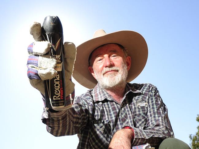 Blair McFarland,operations manager of CAYLUS, Tangentyere council with empty aerosol cans collected around Billy Goat Hill that were used by young indigenous youth. Blair is looking forward to discussions about the possibility of changing legislation around football games so retailers are legally not allowed to stock cans on shelves due to the recent spike of inhalant use. Picture Justin Brierty