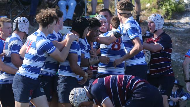 Macarius Pereira, centre, in the middle of the mob. Picture by Richard Gosling