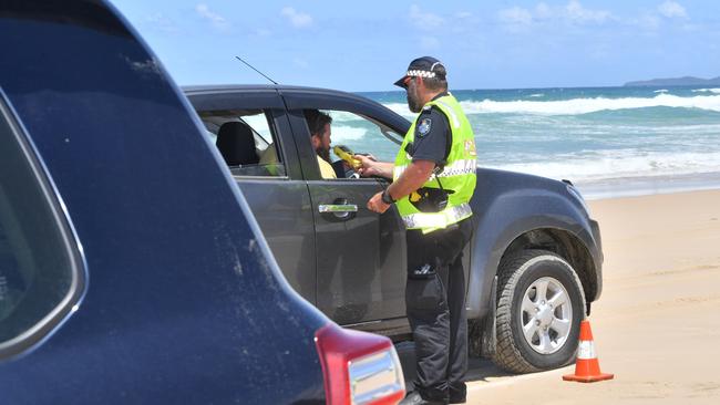 Police officers checking on the beach traffic at Teewah earlier this year. Police saturated beaches across the Wide Bay Burnett over the weekend, arresting 186 people as part of the ongoing Operation Whiskey Legion.