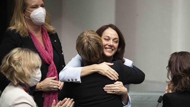 Independent MP for Mackellar Sophie Scamps is congratulated by other crossbenchers, including Zali Steggall (left) after her maiden speech to parliament on Monday. Picture: NCA NewsWire / Gary Ramage