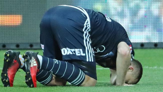 Besart Berisha kisses the Simonds Stadium turf after breaking Archie Thompson’s record. Picture: Getty Images