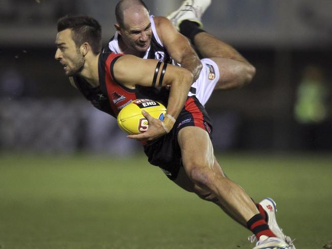 SANFL: West Adelaide v Port Adelaide at Richmond Oval. Port's Matthew Broadbent tackles Wests Brett Turner.29 March 2019. Picture Dean Martin