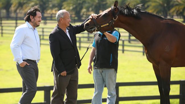 Hong Kong businessman Tony Fung with his son Justin (left) at Aquis Farm with stallion Spill The Beans. Photo: Lyndon Mechielsen.