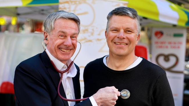 IMB Bank chief executive Rob Ryan (left) with high school teacher Chris Minol during the launch of the heart health check tour at Rouse Hill Town Centre. Picture: Angelo Velardo