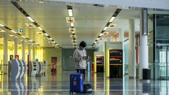 Marvel Wijaya, 19, a university student from Indonesia at Canberra Airport awaiting a flight to Sydney. Picture: Sean Davey