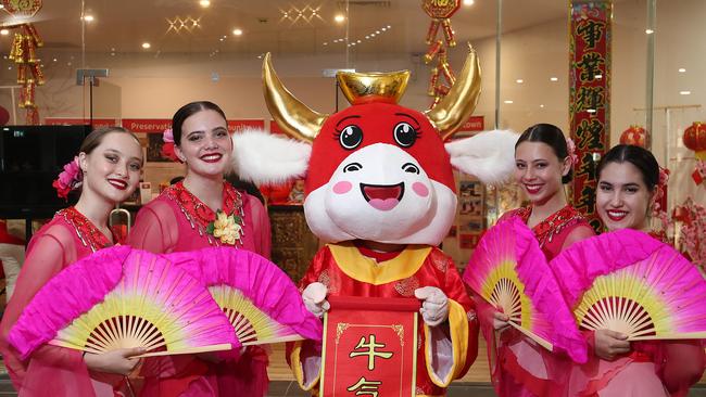 The Cairns and District Chinese Association (CADCAI) dancers Zoe Turnour, Lexie Gillies, Lai Chu Chan, Grace Jones and Martina Lee Long ahead of the Lunar Year of the Ox in 2021. Picture: Brendan Radke