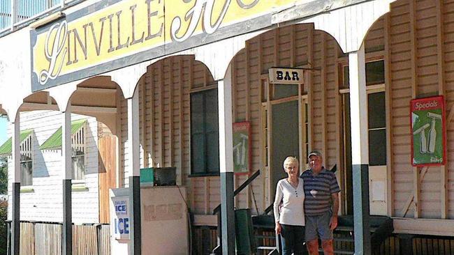 Publicans Bernie and Debbie Kerr serve their last drinks at the Linville Hotel after nearly 36 years in the business. Picture: Contributed