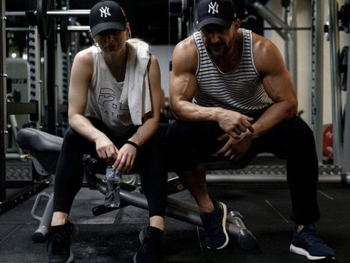 Levi with personal trainer Sam Karam. Picture: Instagram