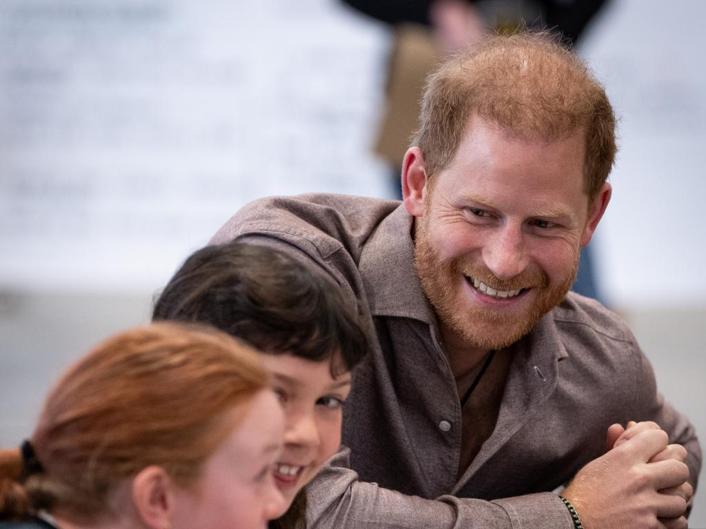 Prince Harry was the king of the kids during a visit to Vancouver for the Invictus Games. Picture: Getty Images