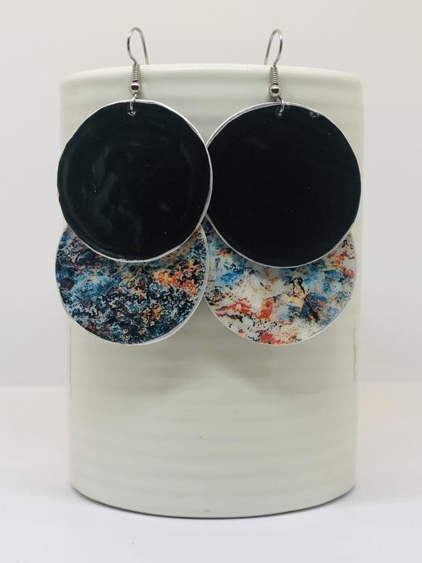 Earrings made from recycled coffee pods by Edie and Bill.