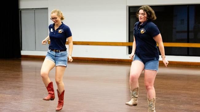 Claire Harris and Kate Strong in action, teaching linedancing in a rural town.