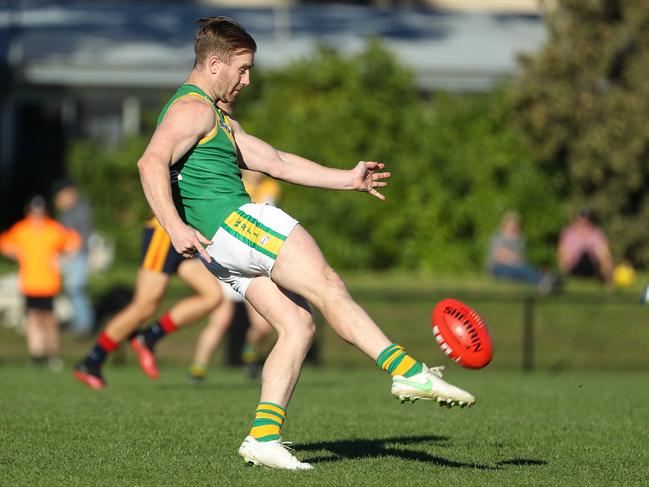 Nick Graham taking a kick for Spotswood in the WRFL this year. Picture: Local Legends Photography