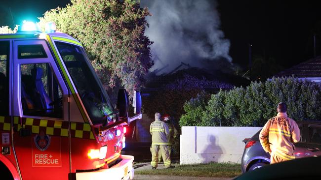 Smoke engulfs the home at Toongabbie. Picture: Dean Asher